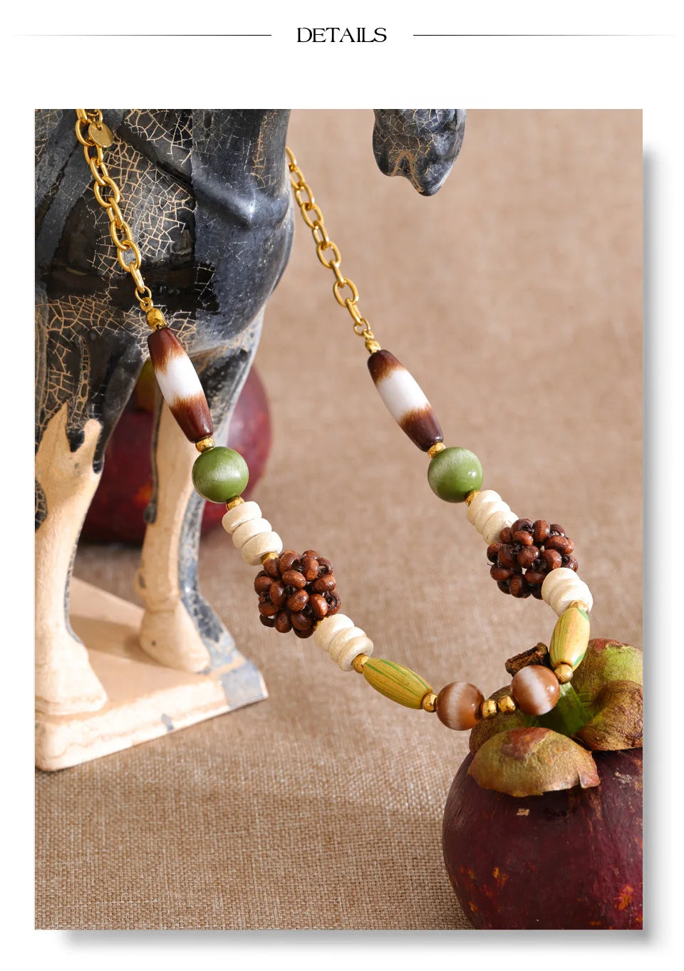 Beaded geometric chain necklace in gold-plated stainless steel.