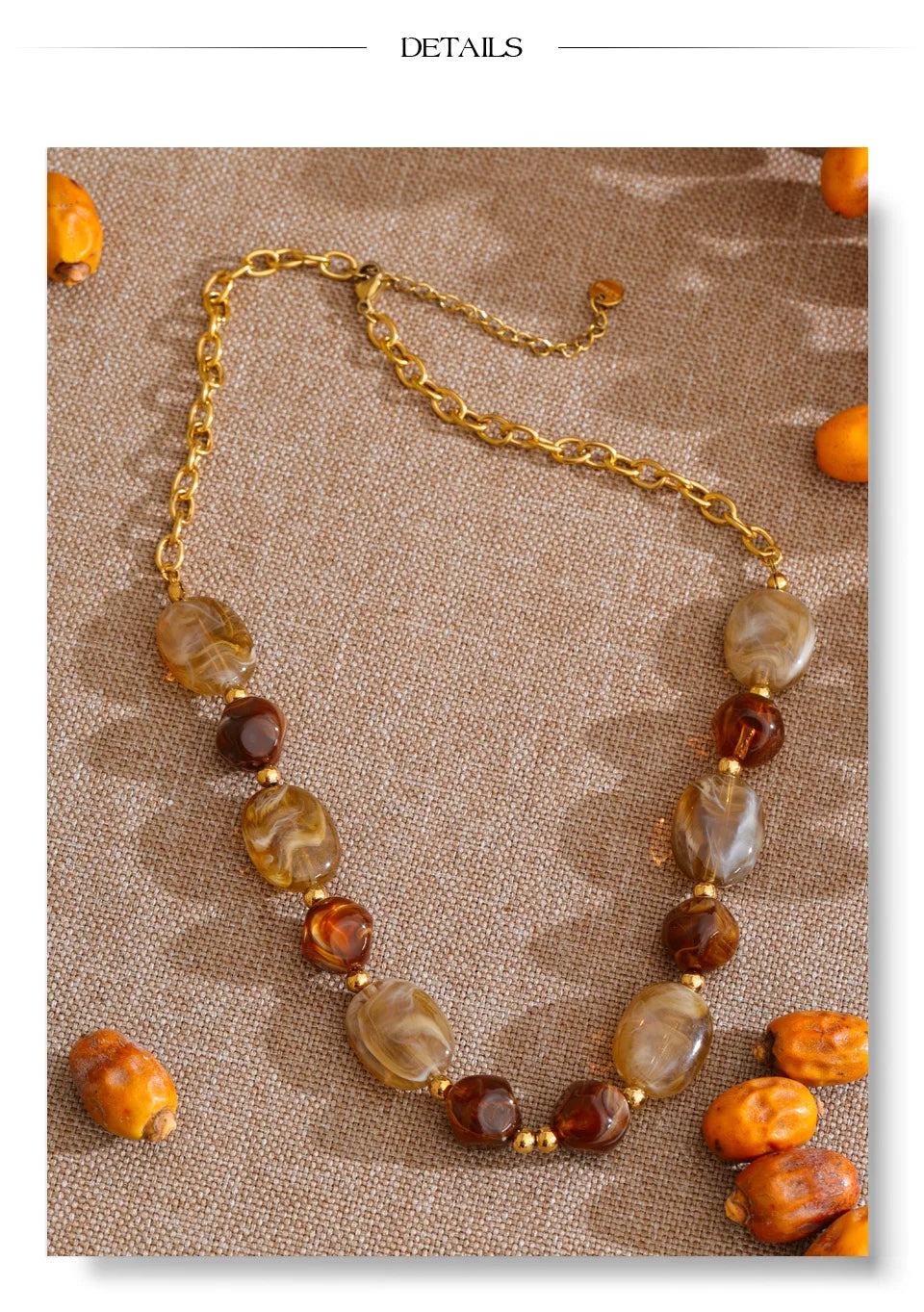 Resin beaded geometric necklace in gold-plated stainless steel with resin.