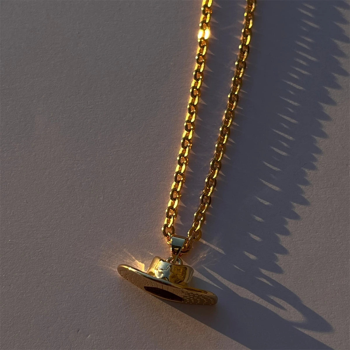 Stainless steel artistic retro cowboy boot cap horseshoe star necklace plated with real gold for color preservation