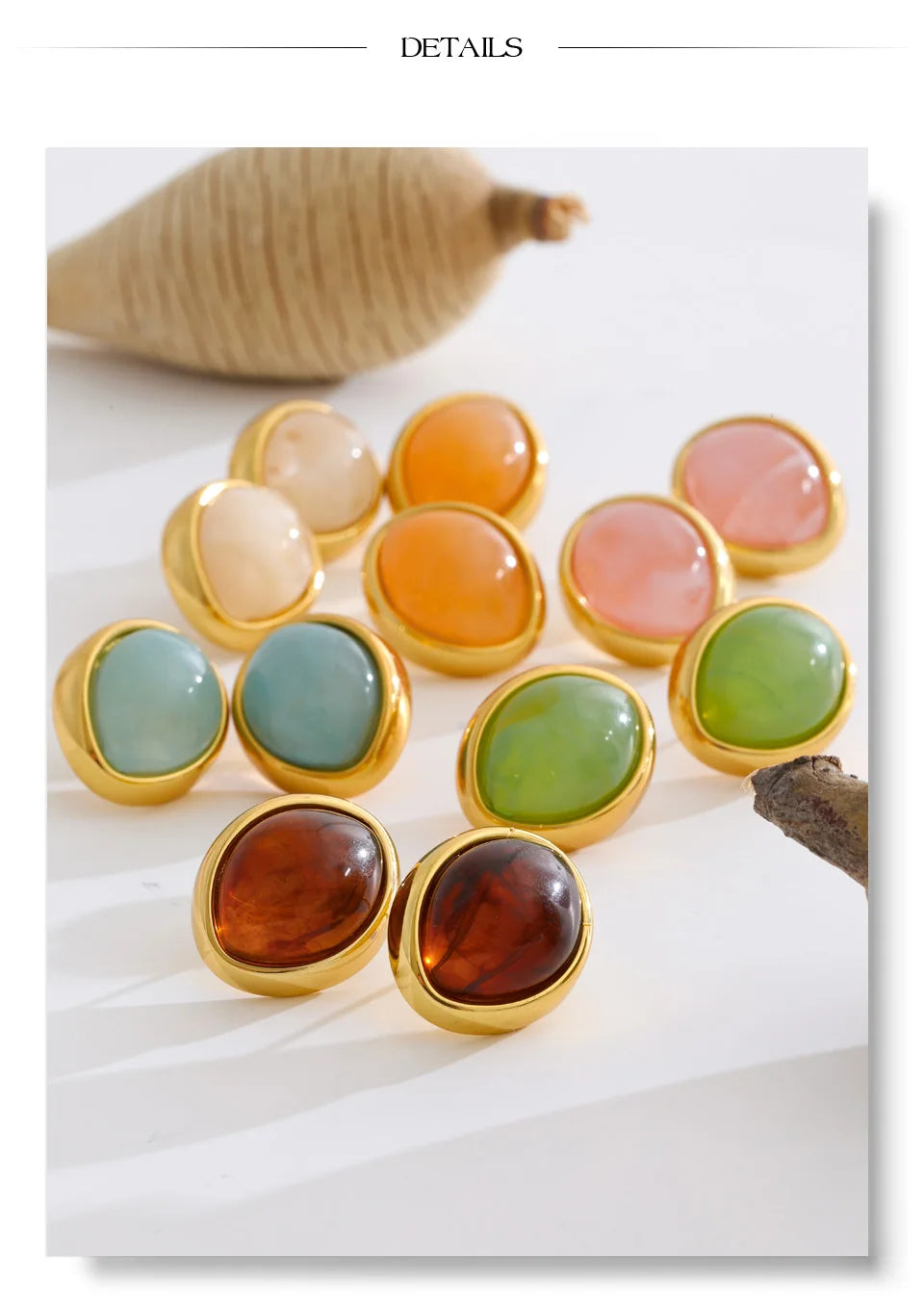 Resin multi-color geometric earrings in gold-plated stainless steel with resin.