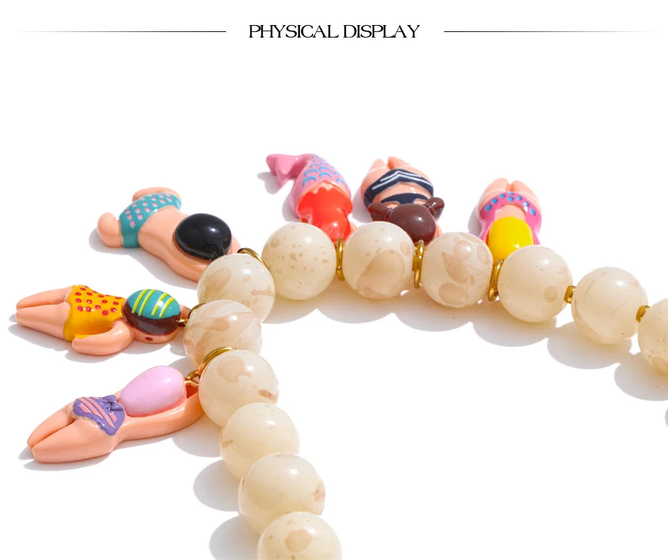 Resin glass natural stone necklace in gold-plated stainless steel with natural stone and resin.