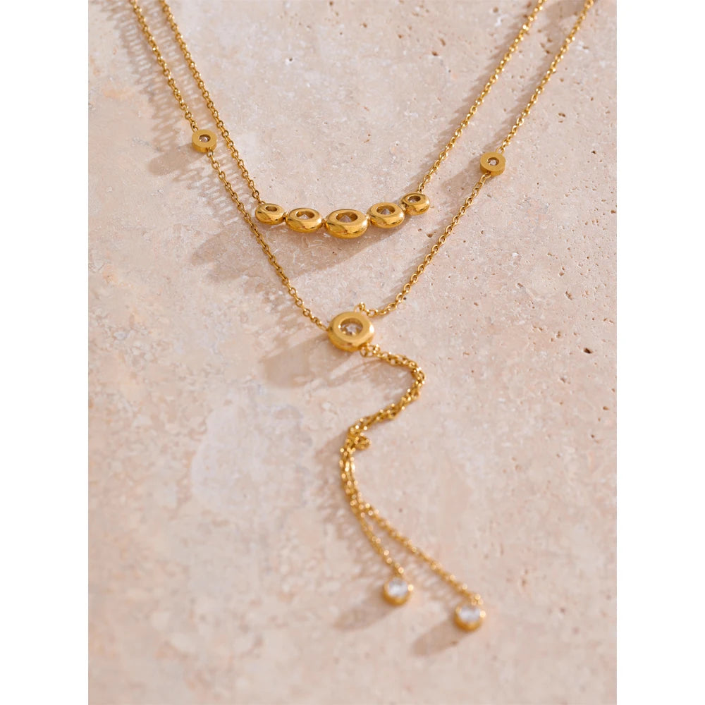 Cubic zirconia geometric chain necklace in gold-plated stainless steel with cubic zirconia.