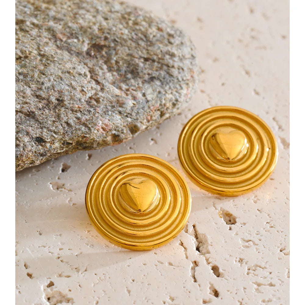 Heart geometric earrings in gold-plated stainless steel.