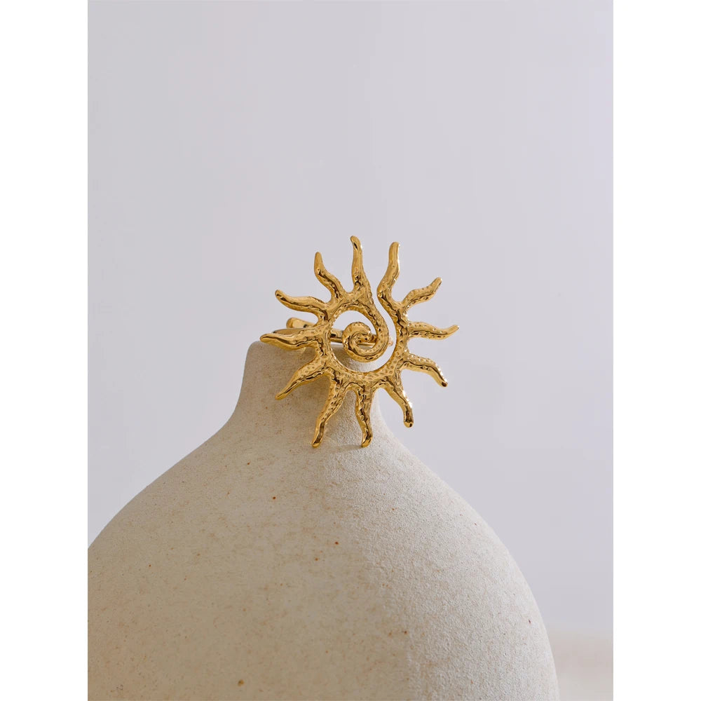 Sun geometric ring in 18K gold-plated stainless steel.