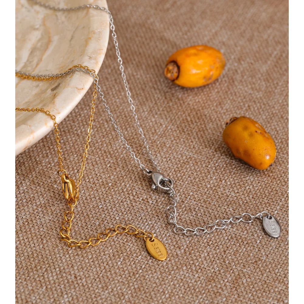 Geometric necklace in gold-plated stainless steel.