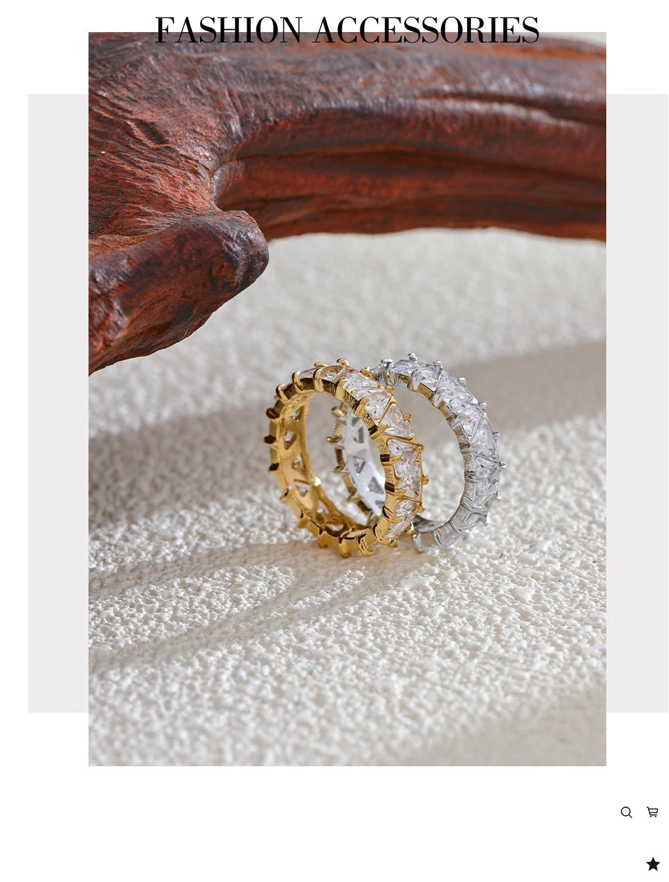 Cubic zirconia heart geometric ring in gold-plated stainless steel with cubic zirconia.