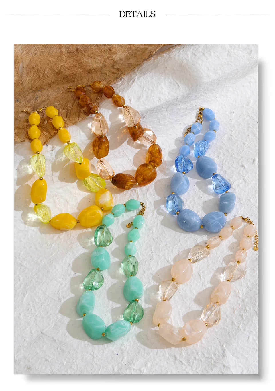 Resin acrylic geometric necklace in gold-plated stainless steel with resin and acrylic.