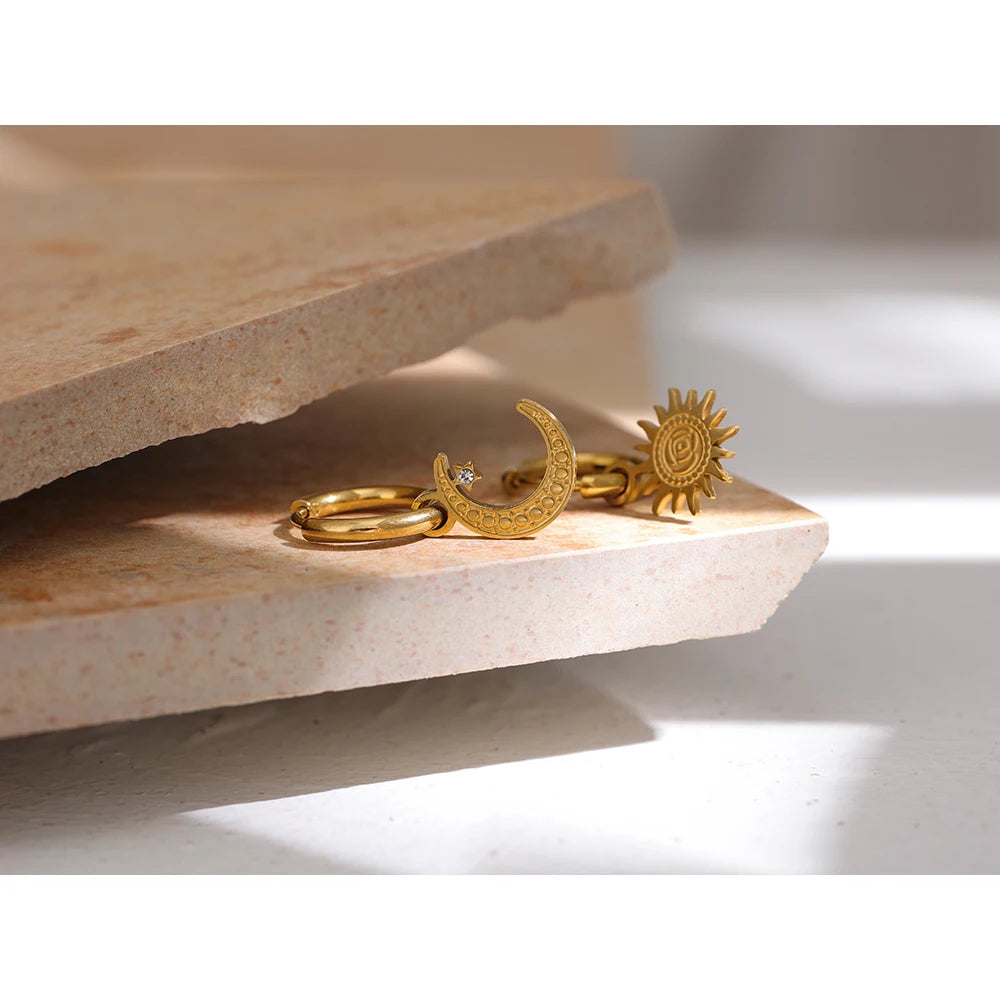 Star moon hammered earrings in gold-plated stainless steel.