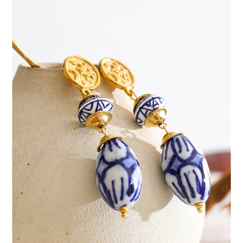 Blue geometric earrings in gold-plated stainless steel.