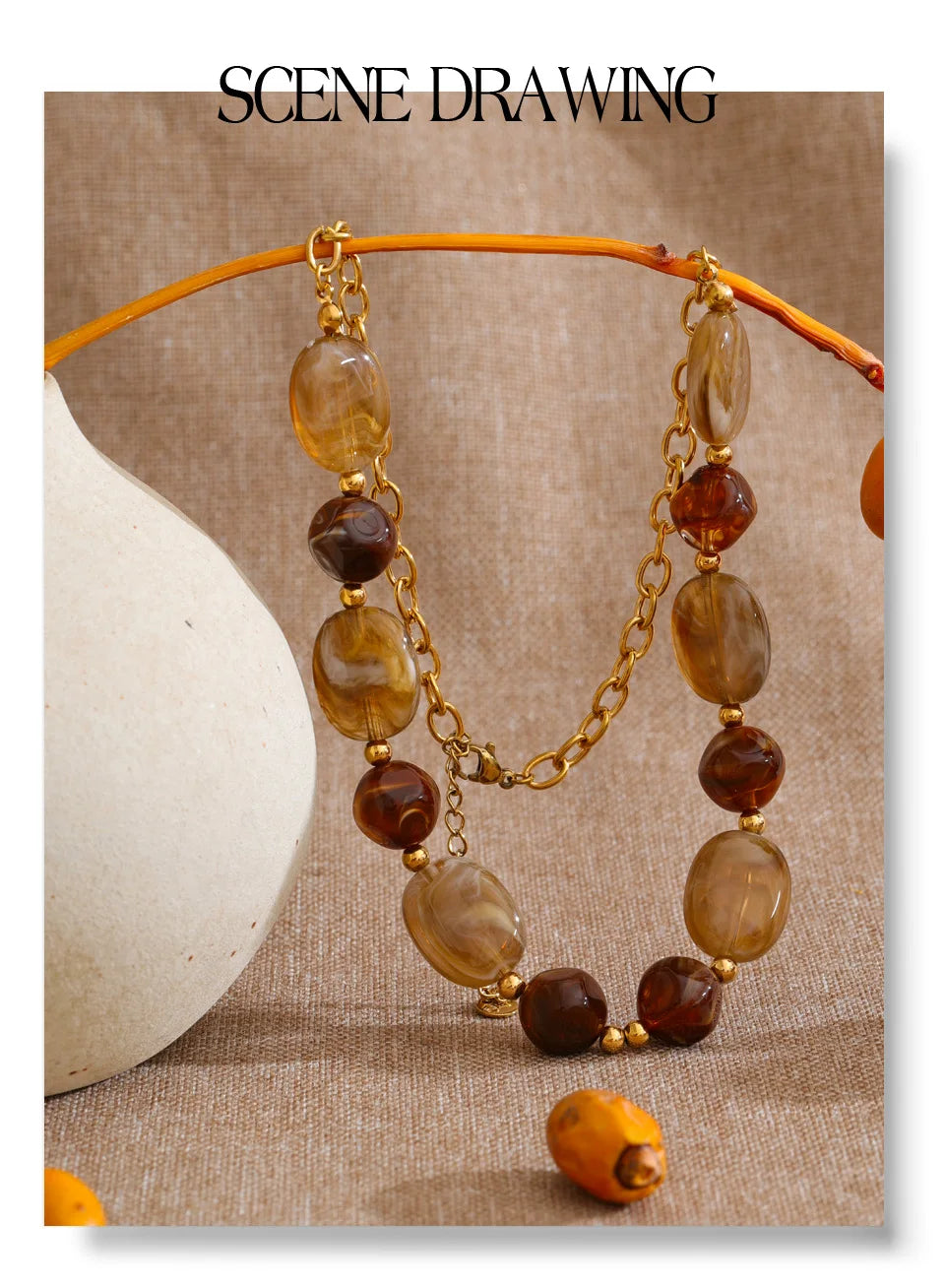 Resin beaded geometric necklace in gold-plated stainless steel with resin.