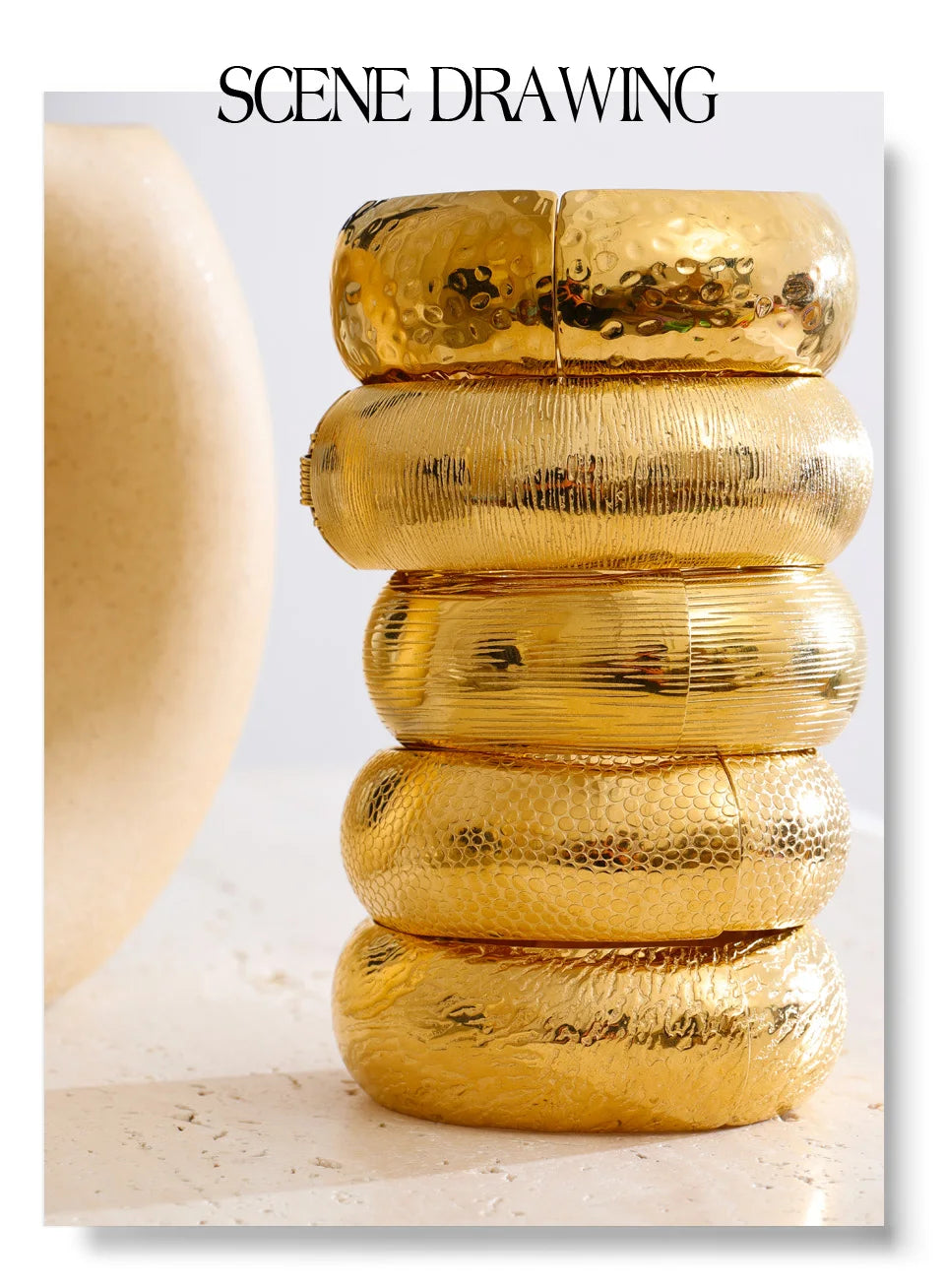 Hammered geometric bracelet in gold-plated stainless steel.