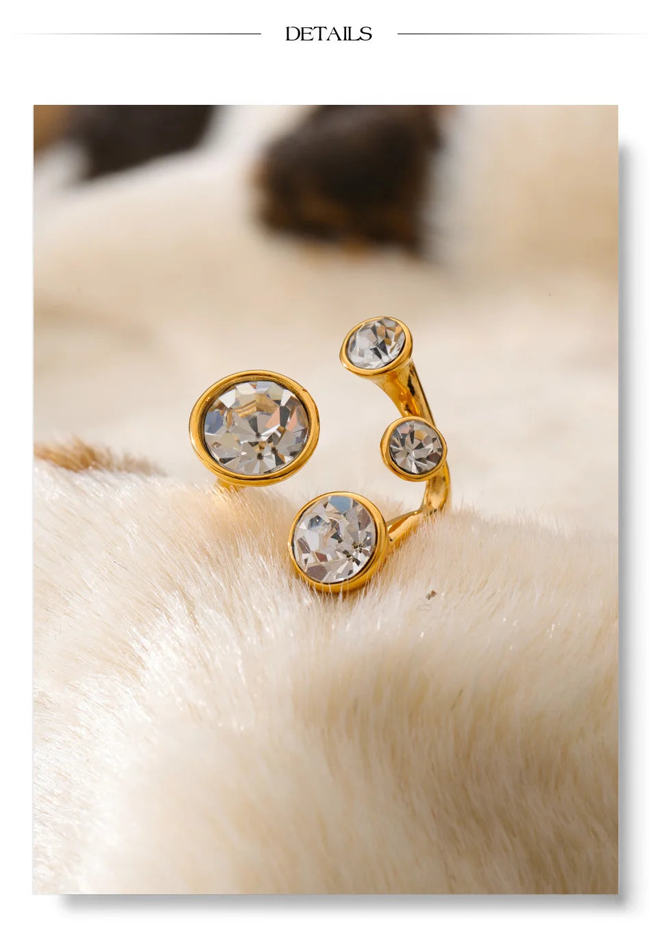 Crystal geometric ring in 18K gold-plated stainless steel with crystal.