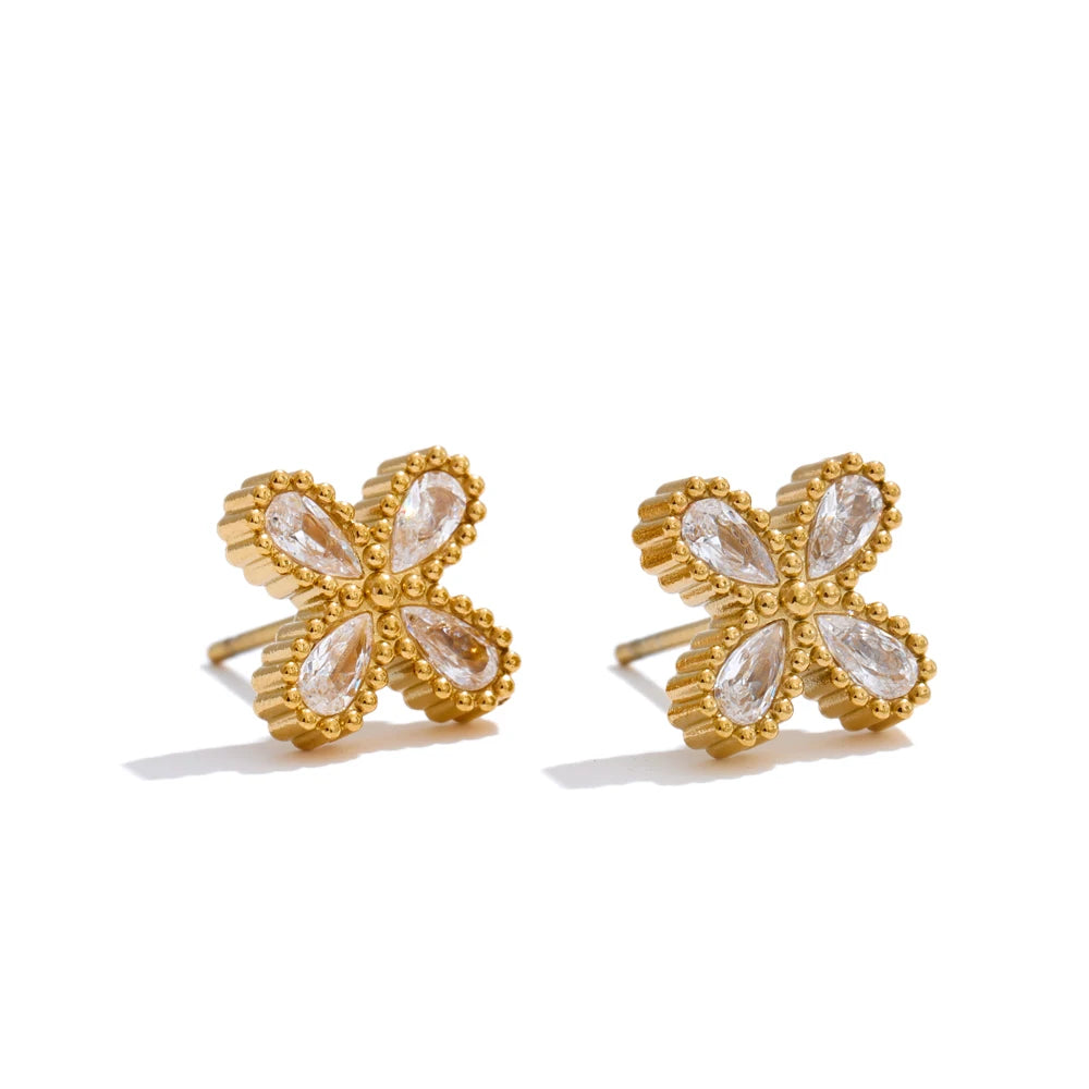 Cubic zirconia flower earrings in gold-plated stainless steel with cubic zirconia.