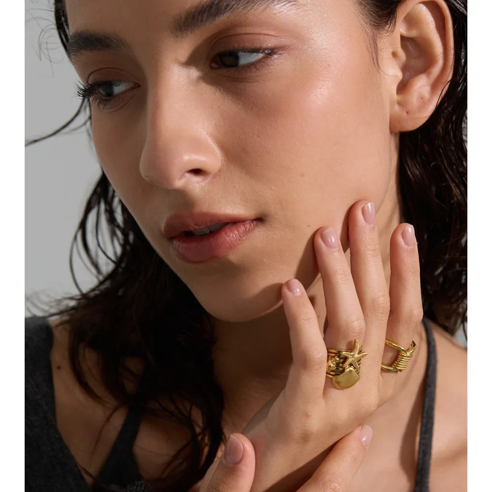 Geometric ring in gold-plated stainless steel.