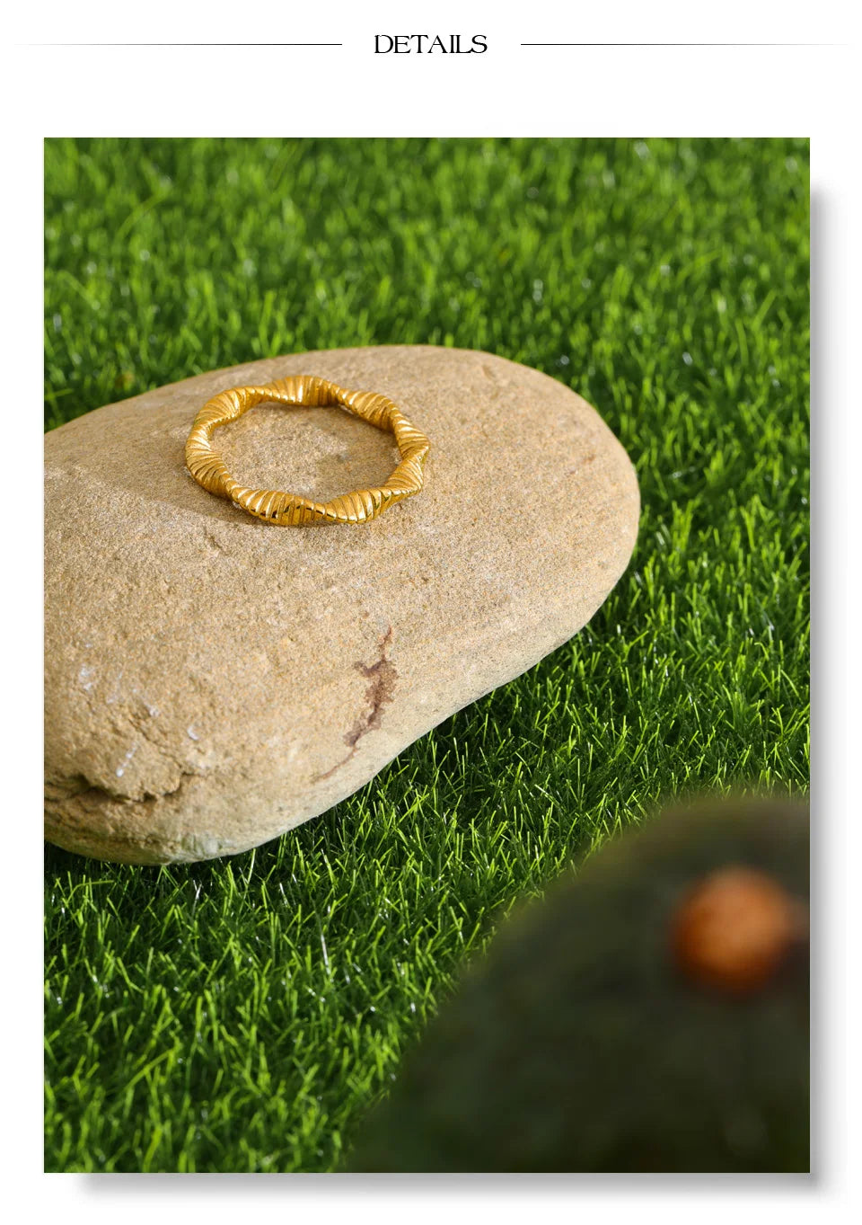 Geometric ring in 18K gold-plated stainless steel.