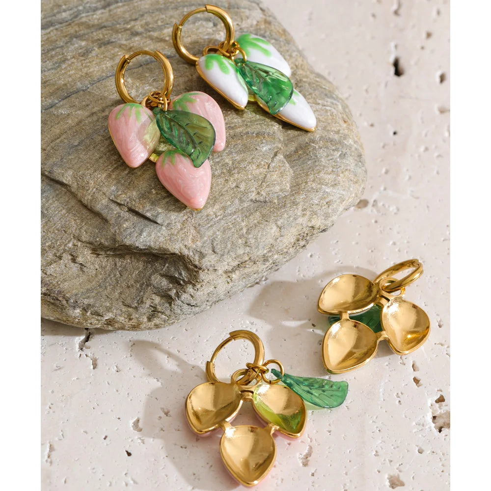 White geometric earrings in gold-plated stainless steel.