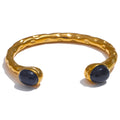 Natural stone geometric bracelet in gold-plated stainless steel with natural stone.