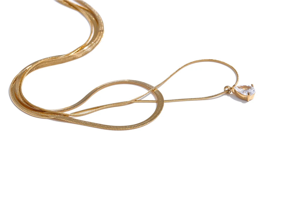Cubic zirconia snake geometric necklace in gold-plated stainless steel with cubic zirconia.