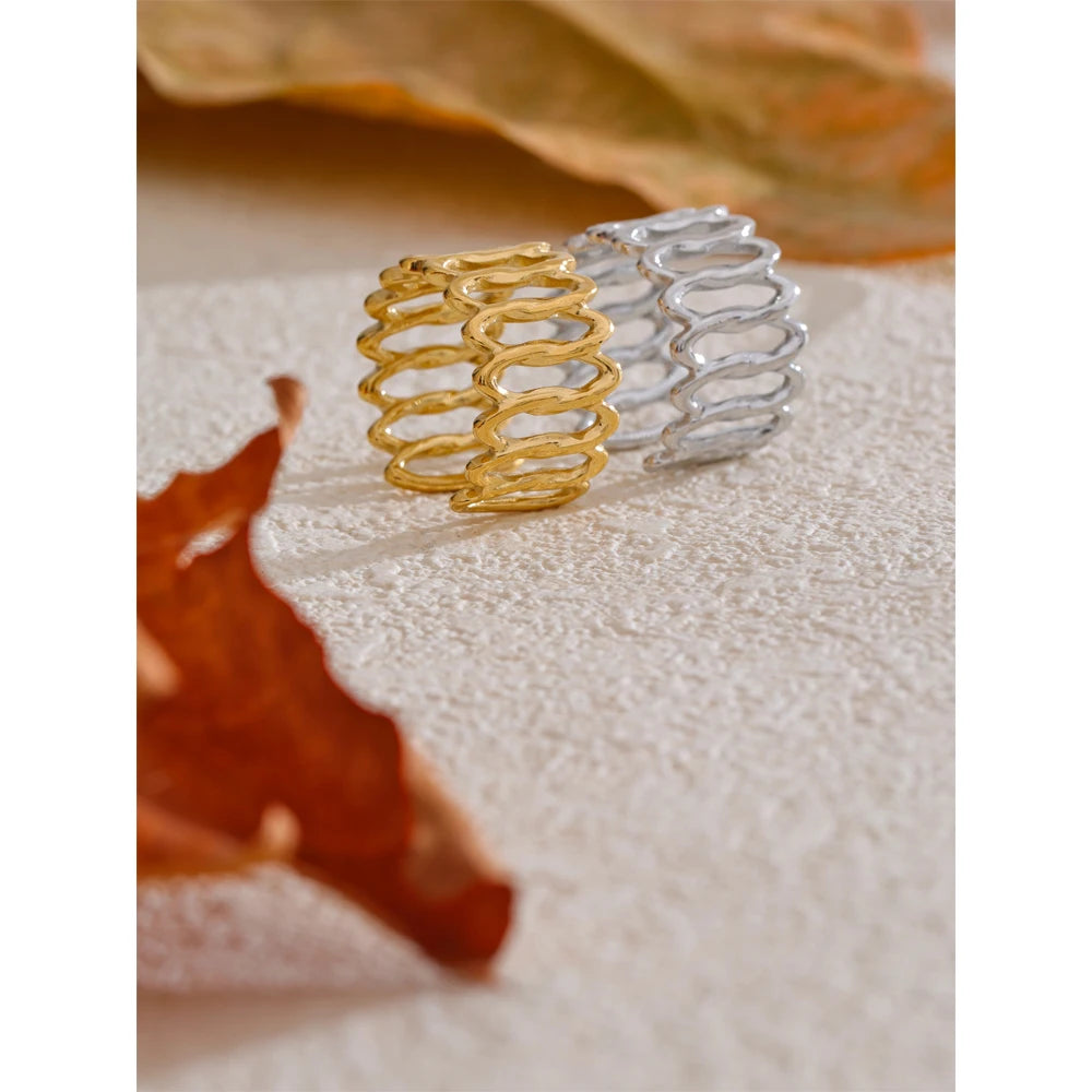 Geometric ring in gold-plated stainless steel.