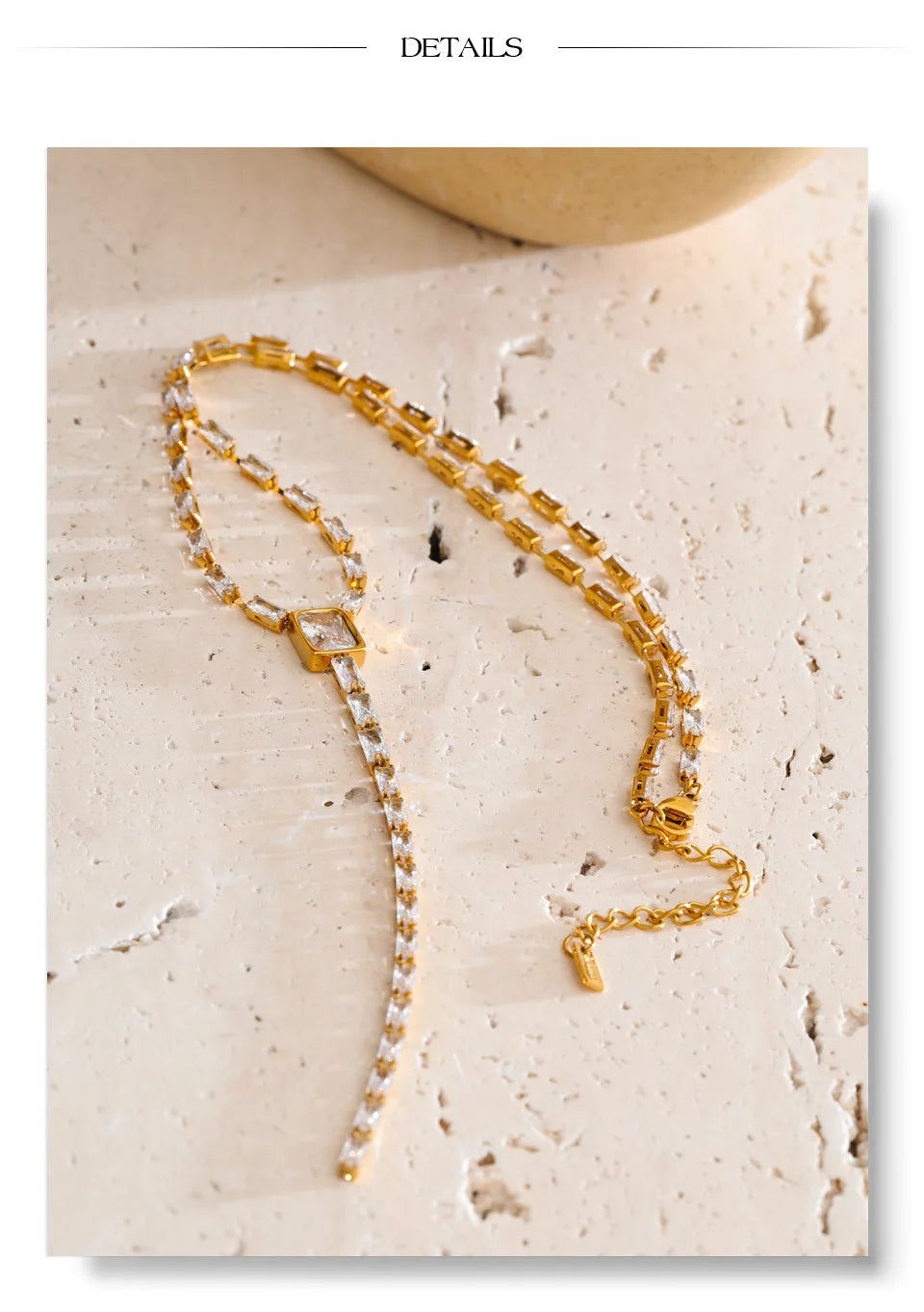 Cubic zirconia geometric chain necklace in gold-plated stainless steel with cubic zirconia.
