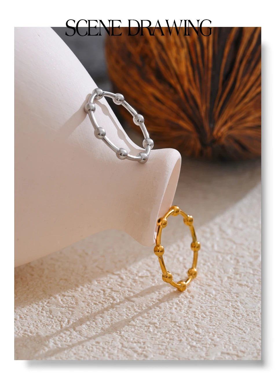 Beaded minimalist geometric ring in 18K gold-plated stainless steel.