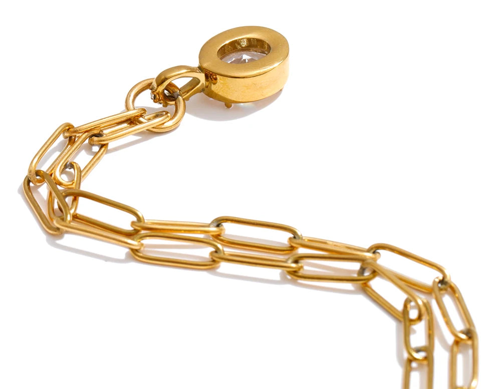 Cubic zirconia geometric necklace in gold-plated stainless steel with cubic zirconia.