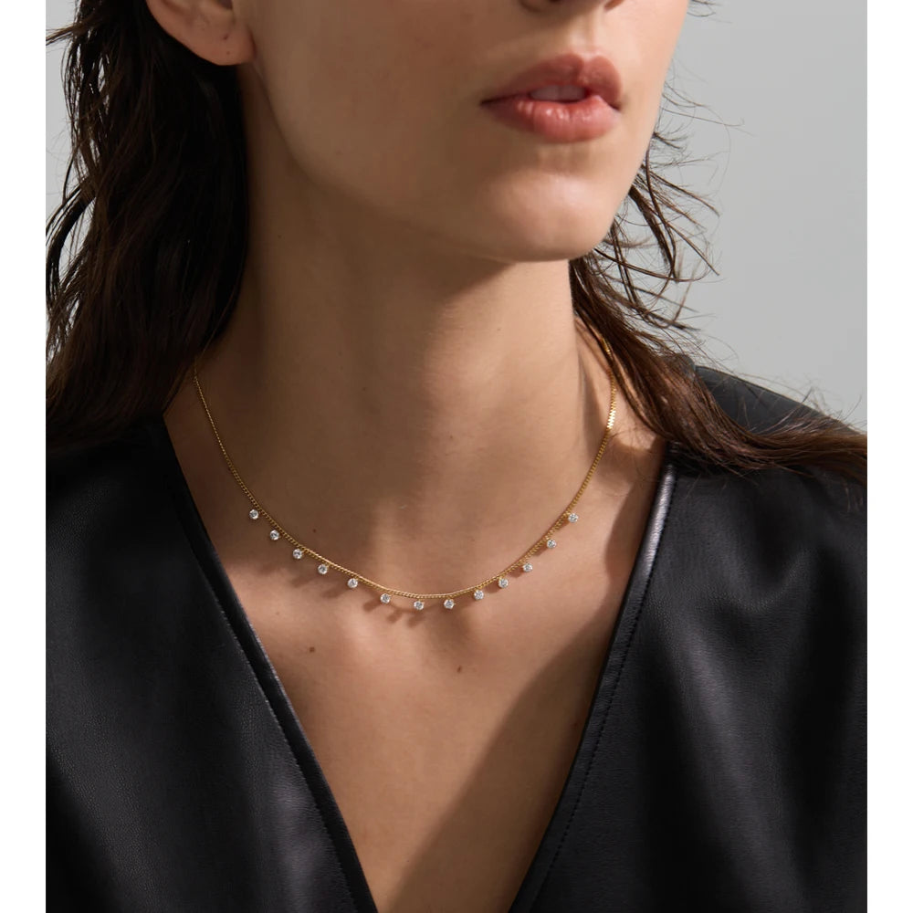 Cubic zirconia geometric chain necklace in gold-plated stainless steel with cubic zirconia.