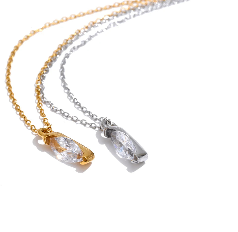 Cubic zirconia geometric necklace in gold-plated stainless steel with cubic zirconia.