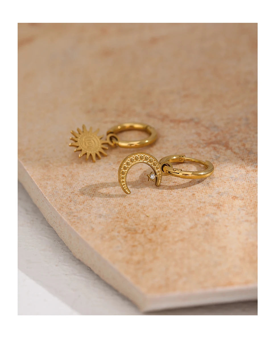 Star moon hammered earrings in gold-plated stainless steel.
