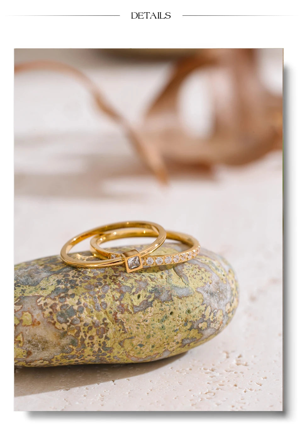 Cubic zirconia geometric ring in 18K gold-plated stainless steel with cubic zirconia.