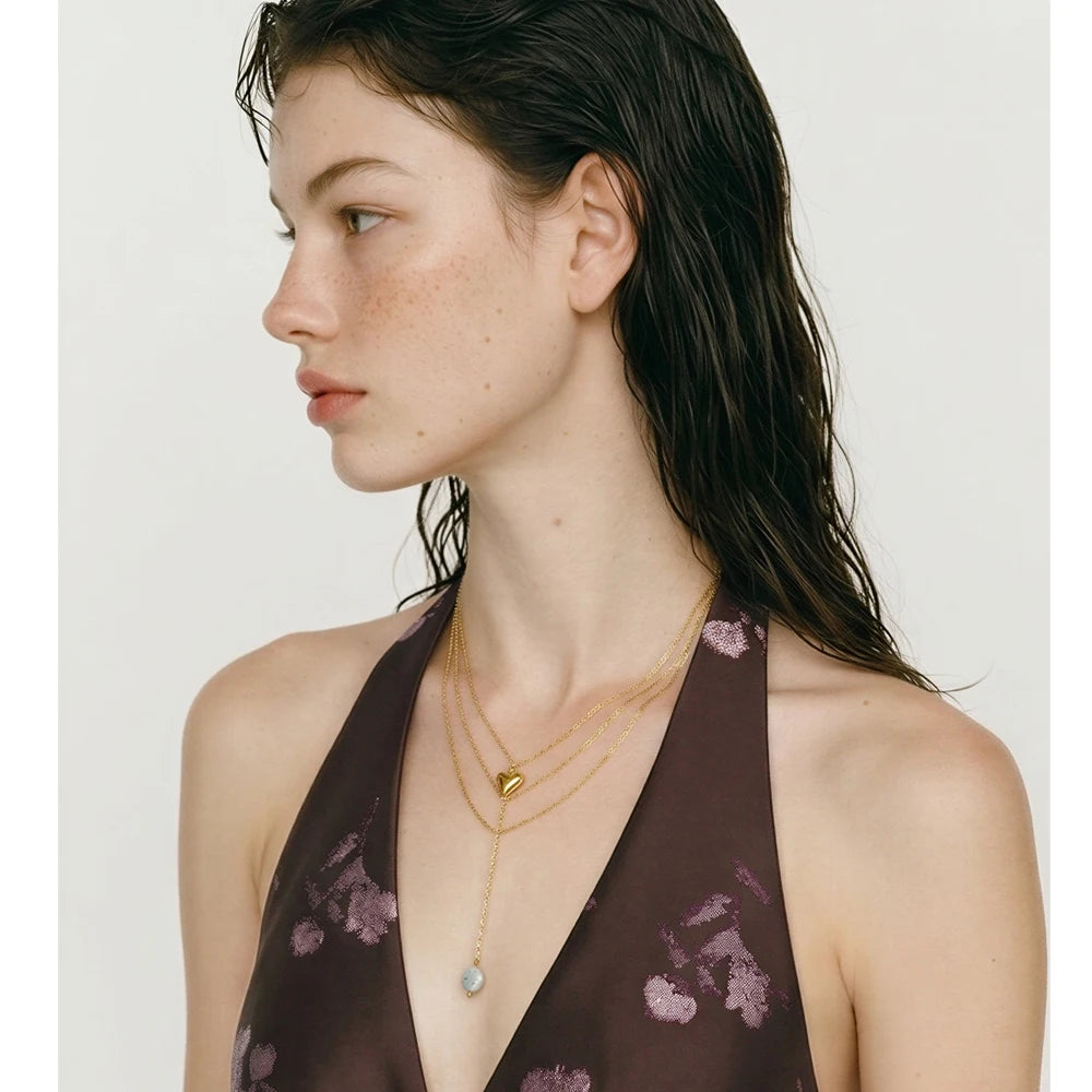 Natural stone heart chain necklace in gold-plated stainless steel with natural stone.
