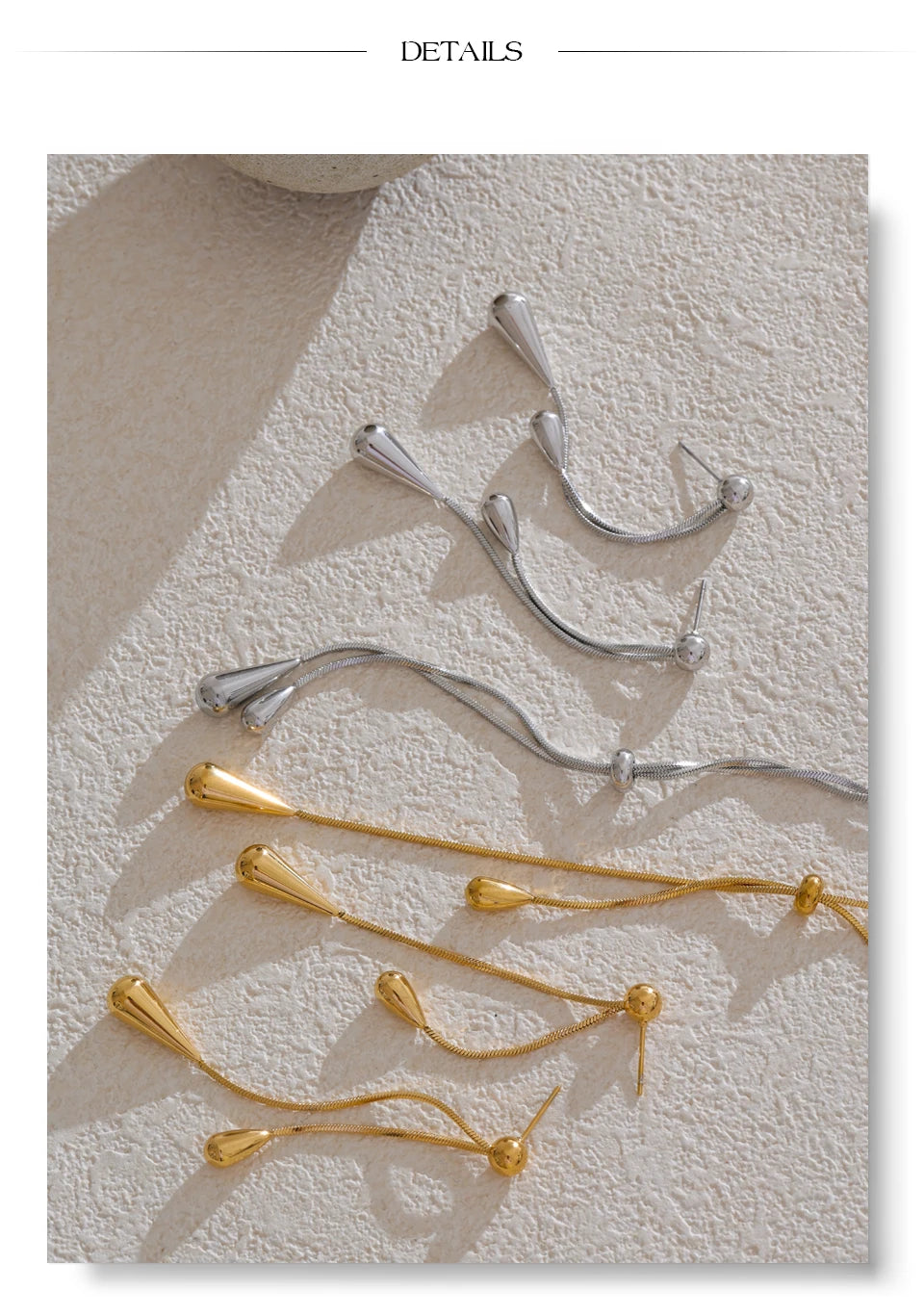 Geometric chain earrings in gold-plated stainless steel.