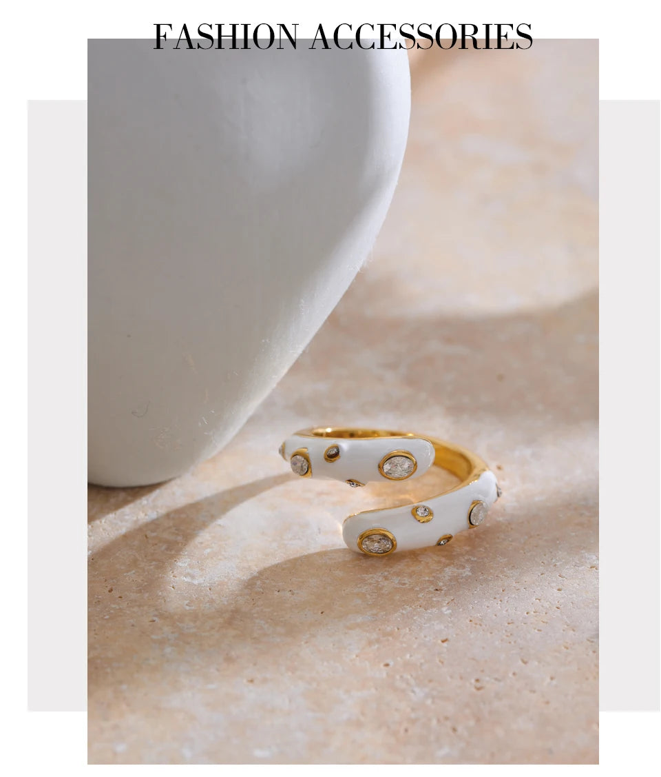 Black cubic zirconia enamel ring in 18K gold-plated stainless steel with cubic zirconia and enamel.