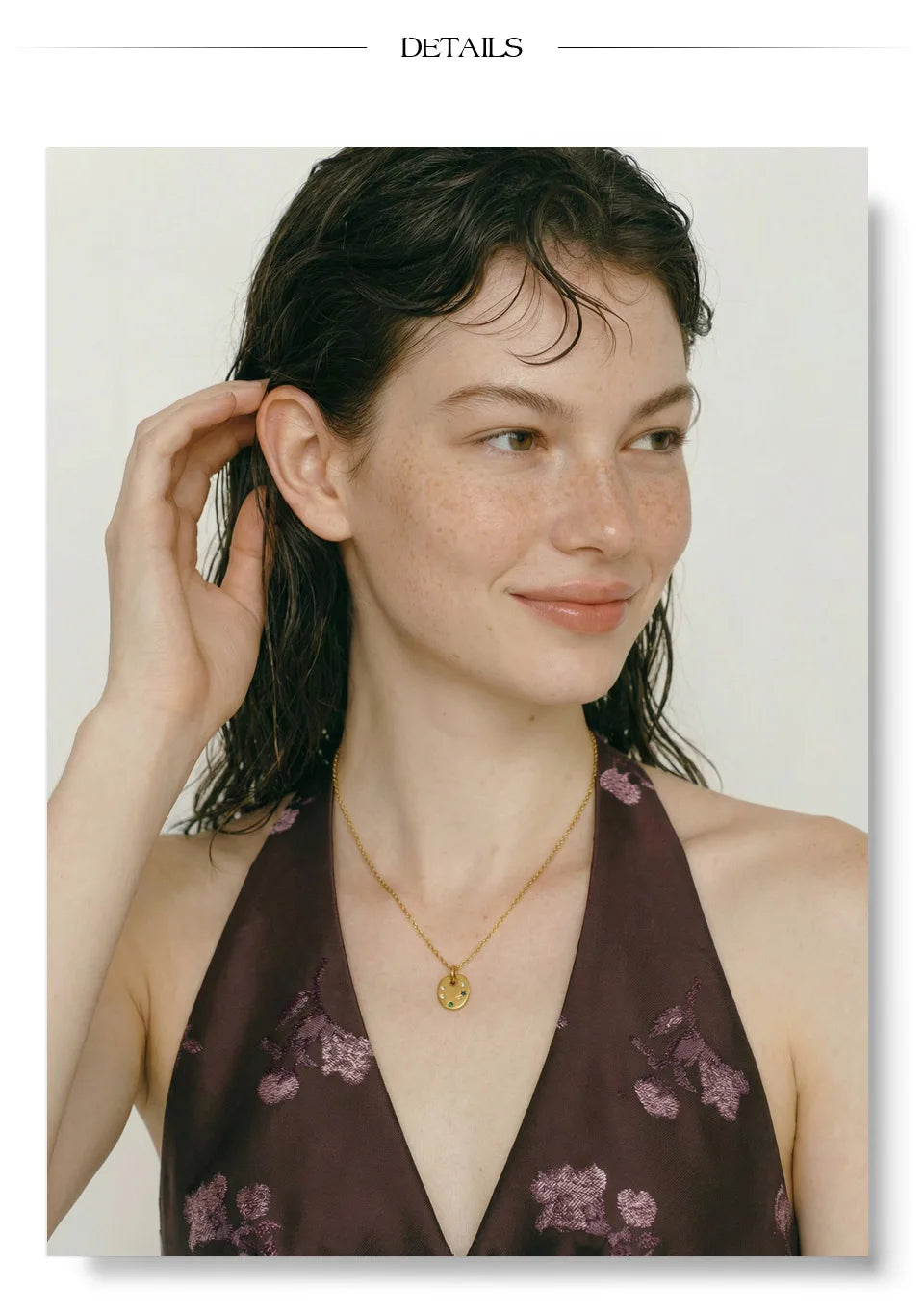 Cubic zirconia multi-color geometric necklace in gold-plated stainless steel with cubic zirconia.