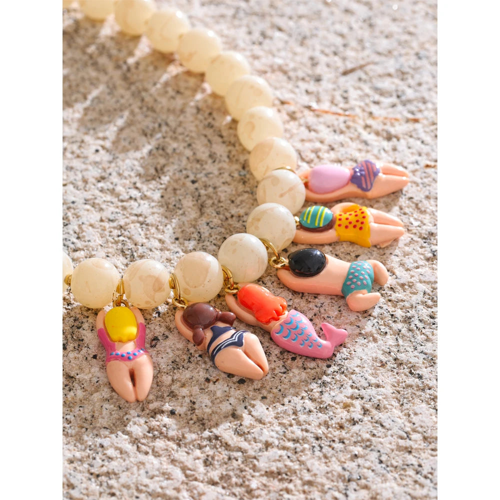 Resin glass natural stone necklace in gold-plated stainless steel with natural stone and resin.