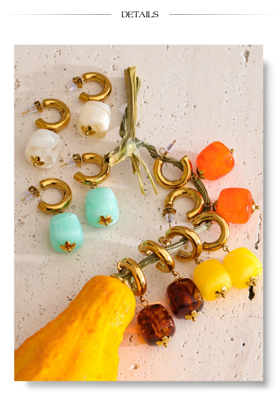 Resin acrylic geometric earrings in gold-plated stainless steel with resin and acrylic.