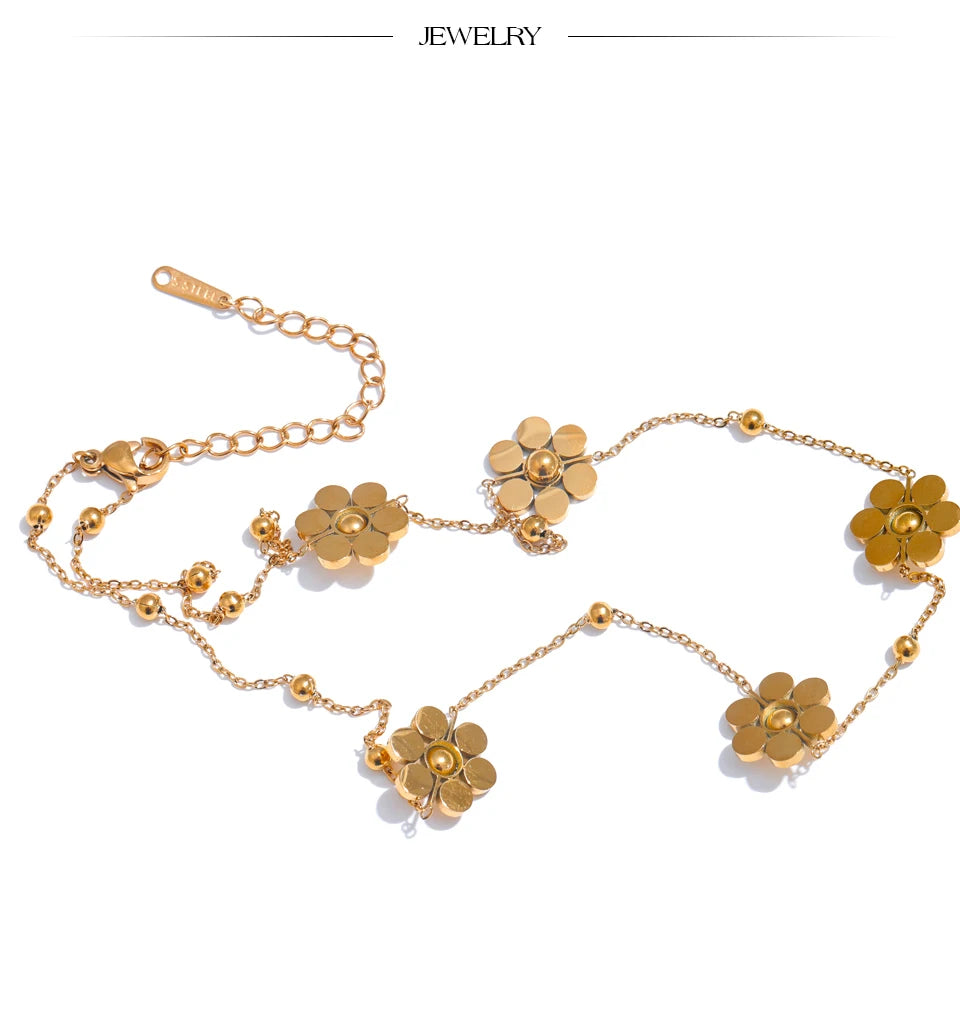 Flower geometric chain necklace in gold-plated stainless steel.