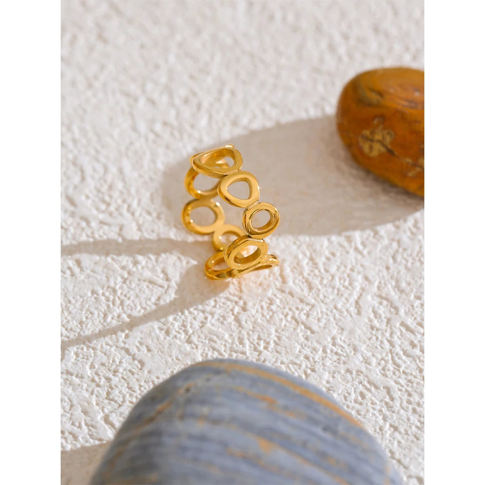 Geometric ring in 18K gold-plated stainless steel.