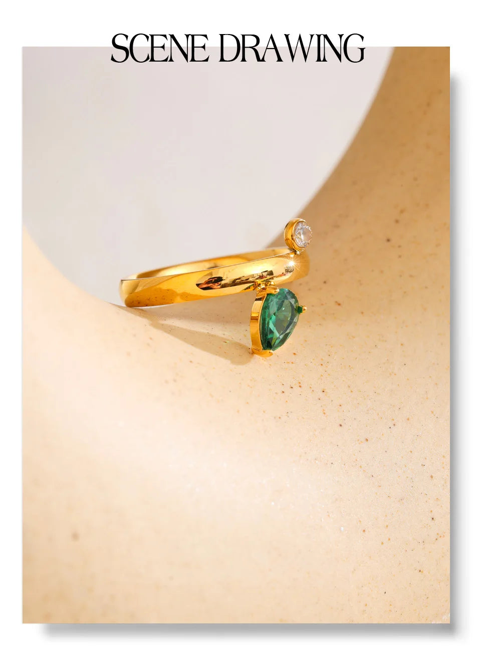 Green cubic zirconia geometric ring in 18K gold-plated stainless steel with cubic zirconia.