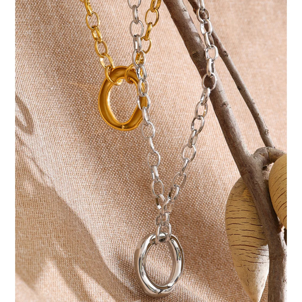 Coin geometric necklace in gold-plated stainless steel.
