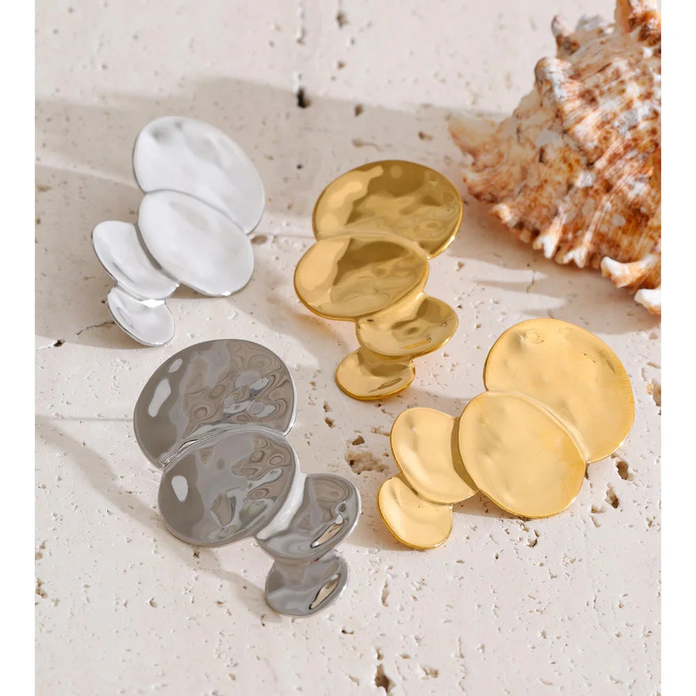 Geometric earrings in gold-plated stainless steel.