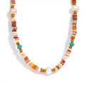 Freshwater pearl natural stone beaded necklace in gold-plated stainless steel with freshwater pearl and natural stone.