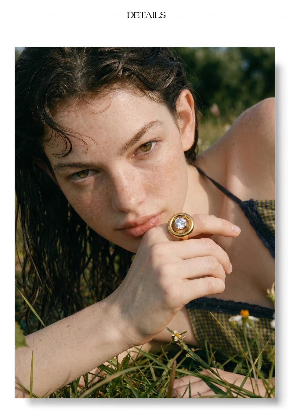 Cubic zirconia geometric ring in 18K gold-plated stainless steel with cubic zirconia.