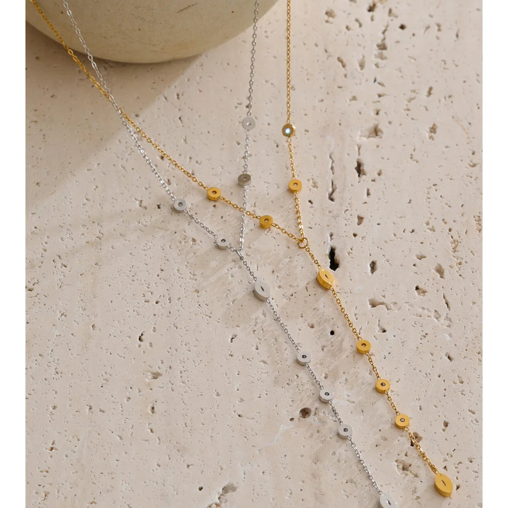 Cubic zirconia geometric chain necklace in gold-plated stainless steel with cubic zirconia.