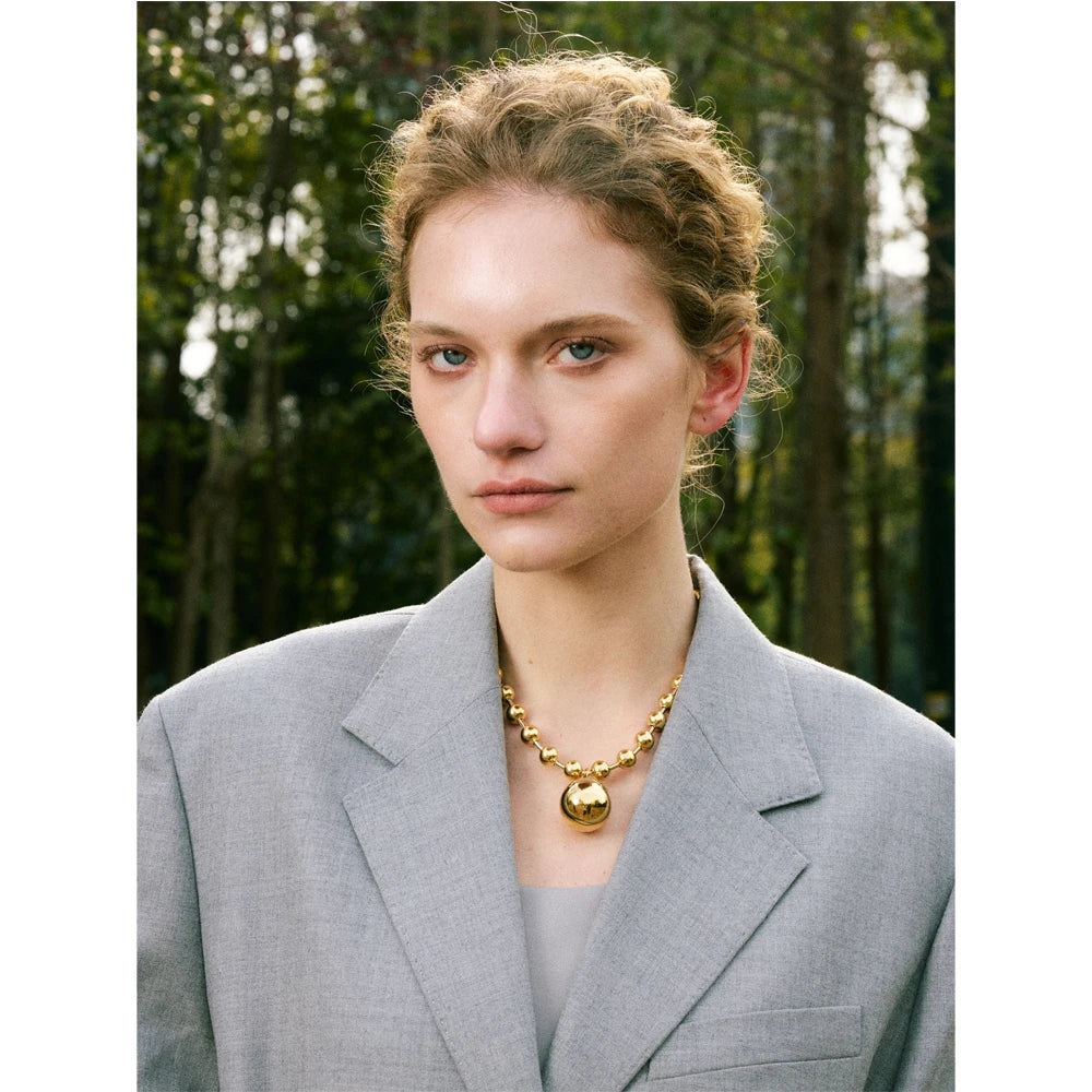 Heart star beaded necklace in gold-plated stainless steel.