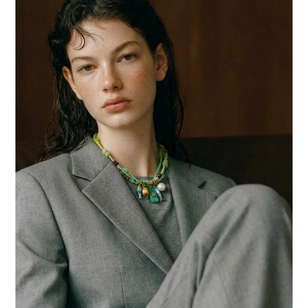Pearl crystal geometric necklace in gold-plated stainless steel with pearl and crystal.