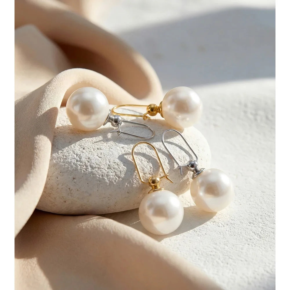 Pearl geometric earrings in gold-plated stainless steel with pearl.