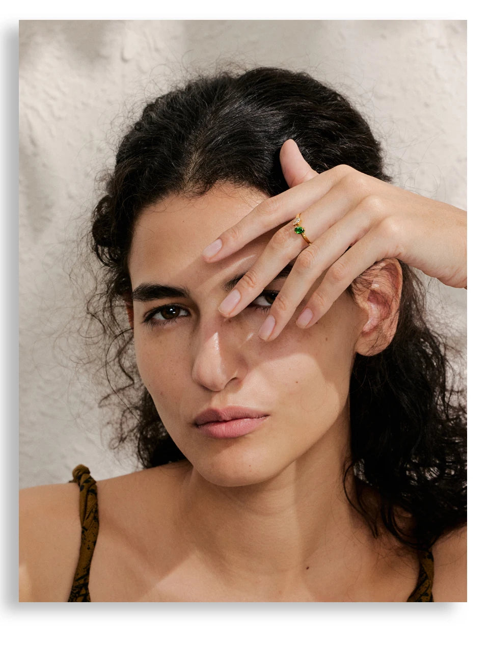Cubic zirconia geometric ring in 18K gold-plated stainless steel with cubic zirconia.