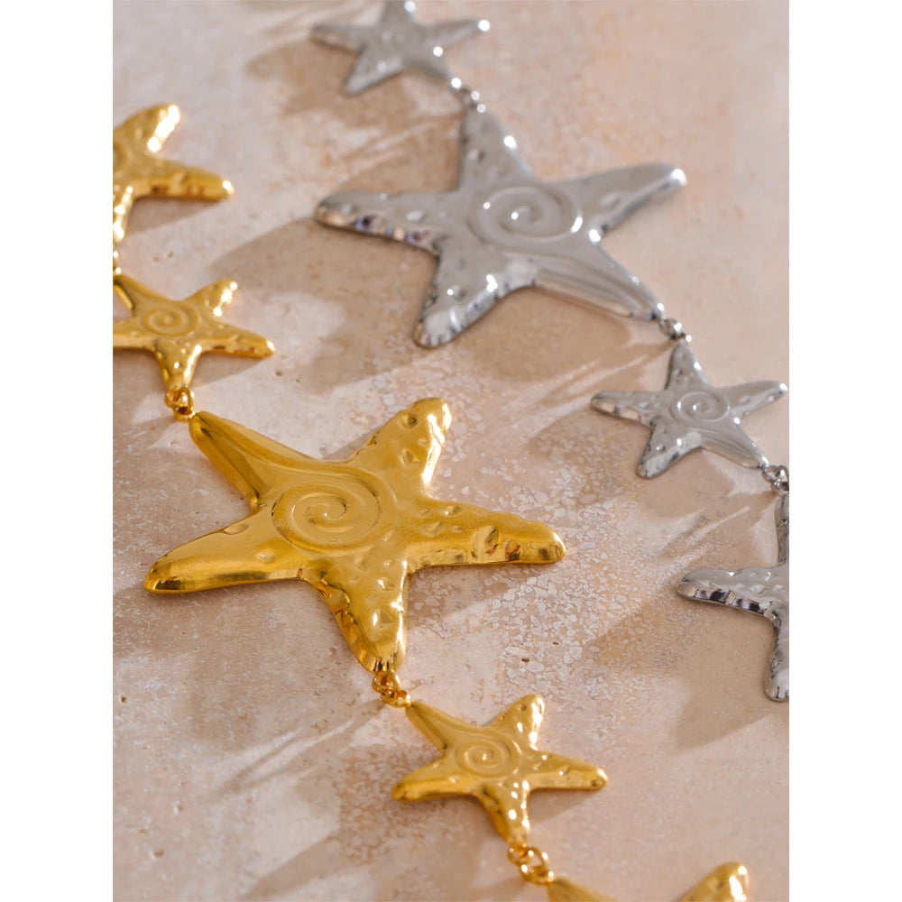 Star chain necklace in gold-plated stainless steel.