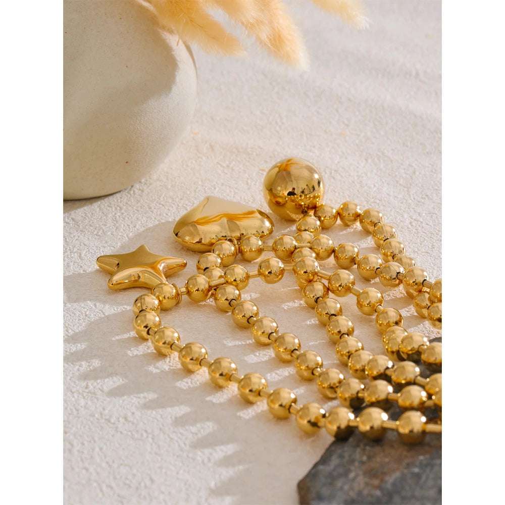 Heart star beaded necklace in gold-plated stainless steel.